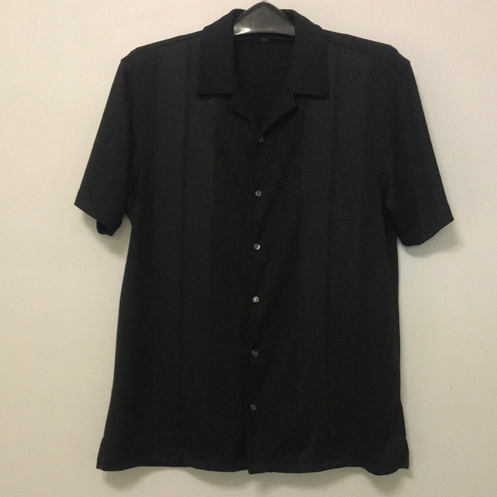 Men’s button up short sleeve dress shirt.